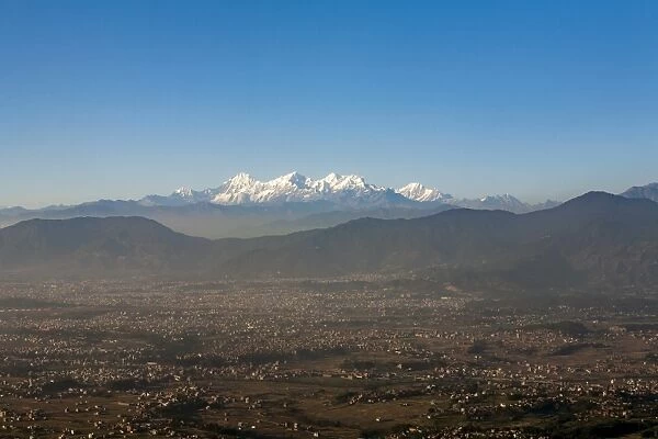 The entire Kathmandu Valley and city with a backdrop of the Himalayas, Nepal, Asia