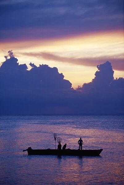 Fishing boat in the Indian Ocean at dawn, island of Zanzibar, Tanzania