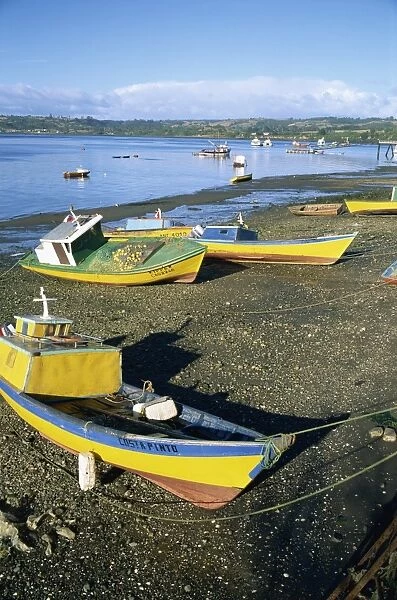 Fishing boats on the beach, zone of Dalcahue, near Castro, Chiloe island