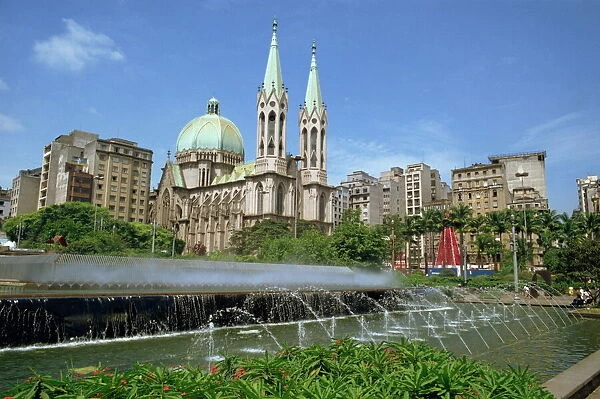 Fountains and the cathedral in the city of Sao Paulo in Brazil, South America
