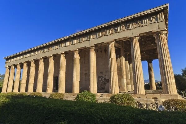 The Hephaisteion (the temple of Hephaistos), lit by early morning light, Ancient Agora of Athens, Athens, Greece, Europe