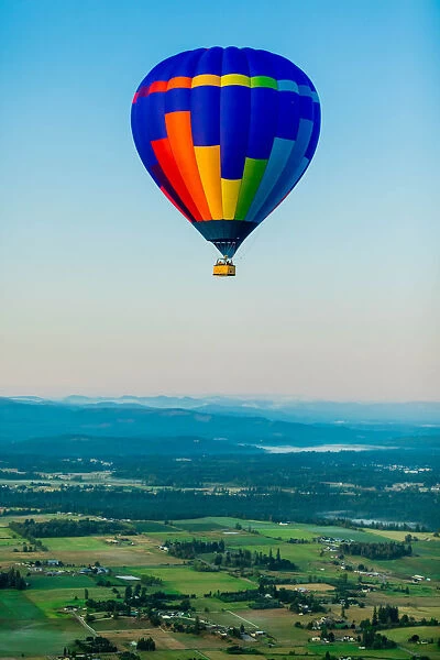 Hot air balloon over Auburns farmland, Washington State, United States of America