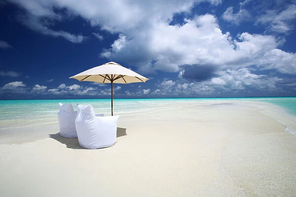 Two Lounge Chairs and Parasol on empty Beach, The Maldives, Indian Ocean, Asia