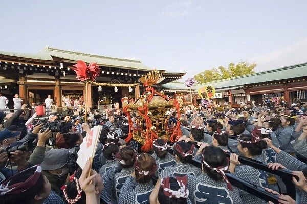 Mikoshi portable shrine being carried at Hadaka Matsuri (Naked Festival)