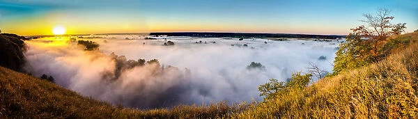 Misty dawn over hills and river, Ukraine, Europe