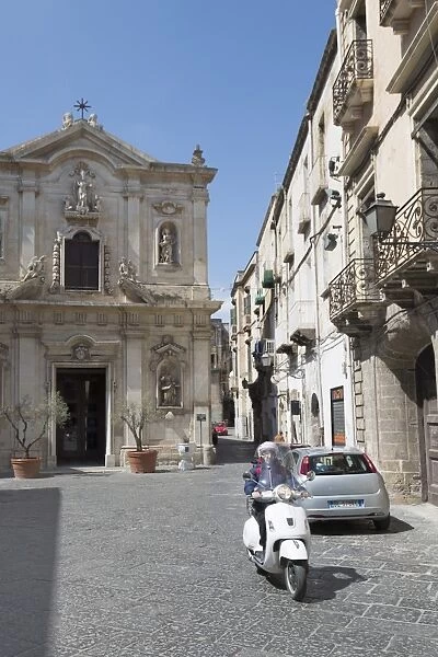 Motor scooter and Cattedrale di San Cataldo in Taranto, Basilicata, Italy, Europe