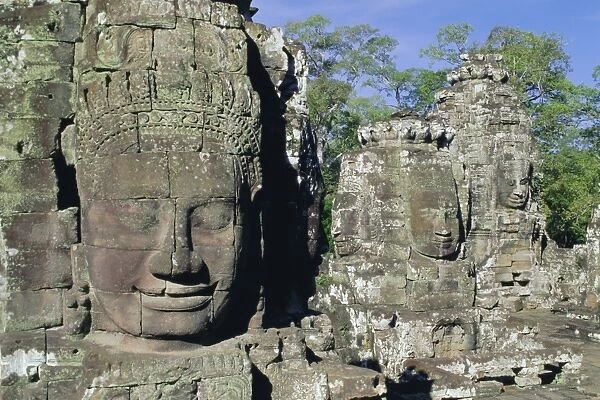 Myriad stone heads typifying Cambodia, the Bayon Temple, Angkor, Siem Reap