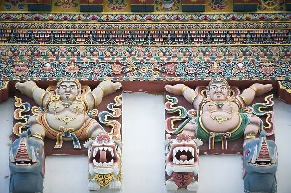 Painted figures on Gangtey Gompa (Monastery), Phobjikha Valley, Bhutan, Asia