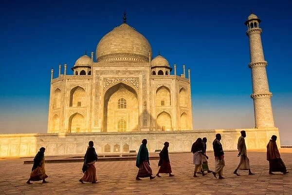 People walking to pray in front of the Taj Mahal, UNESCO World Heritage Site, Agra