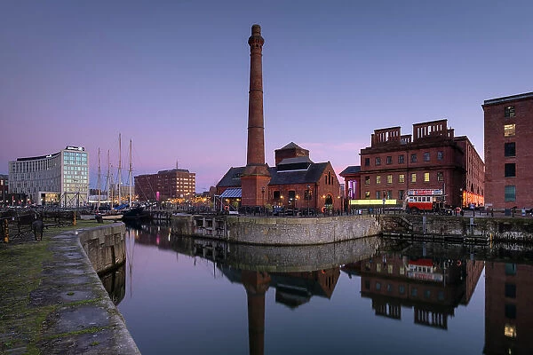 The Pumphouse and buildings of Albert Dock viewed over Canning Dock at twilight, Liverpool Waterfront, Liverpool, Merseyside, England, United Kingdom, Europe