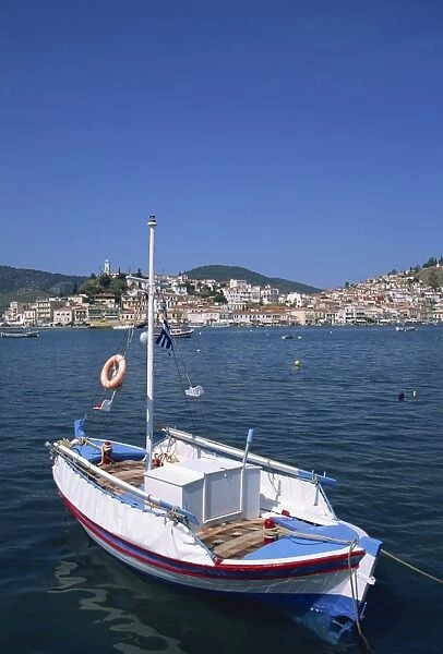 Small boat in harbour on Poros