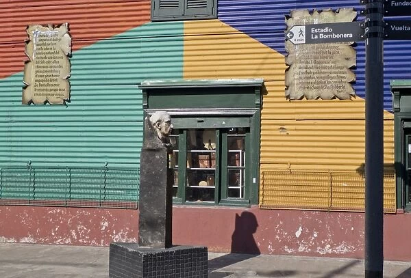 Statue of famous local painter Quinquela Martin at Caminito alley in the Boca, old