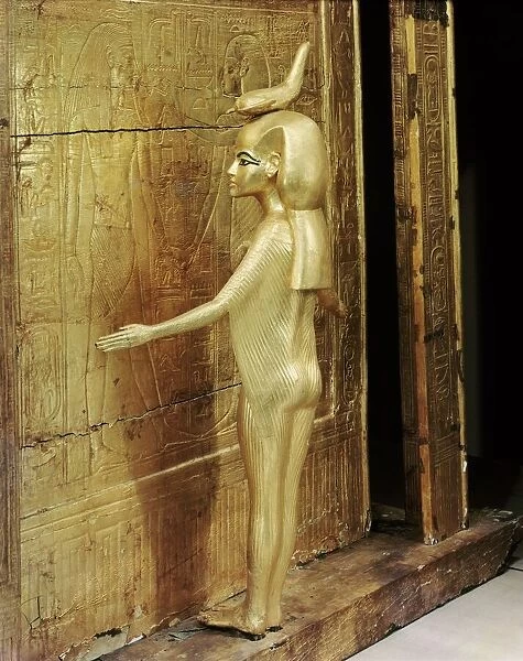 Statue of the goddess Serket protecting the canopic chest or shrine, from the tomb of the pharaoh Tutankhamun, discovered in the Valley of the Kings, Thebes, Egypt, North