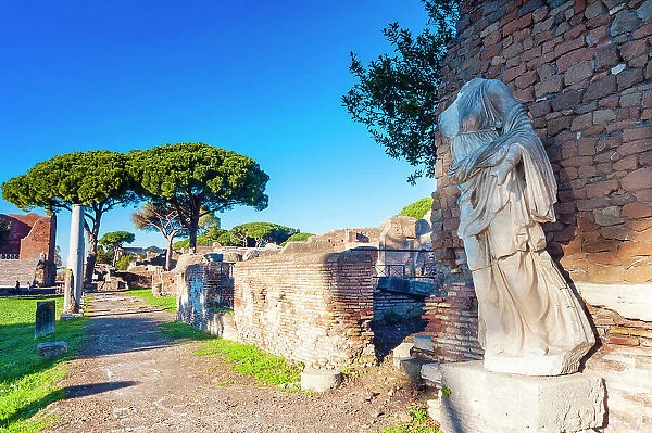 The statue of Victory on the rear of the Temple of Rome and Augustus, Ostia Antica archaeological site, Ostia, Rome province, Latium (Lazio), Italy, Europe