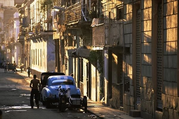 Street scene in evening light, Havana, Cuba, West Indies, Central America