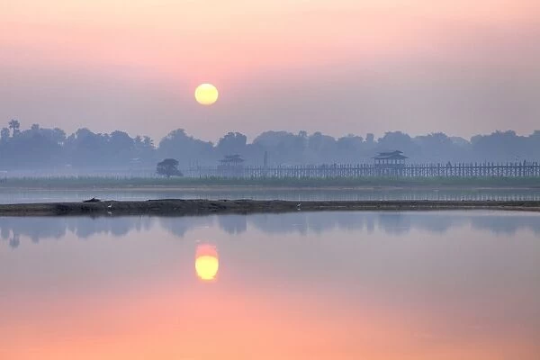 Sunrise over Taungthaman Lake and U Bein Bridge, Amarapura, near Mandalay, Myanmar (Burma), Asia