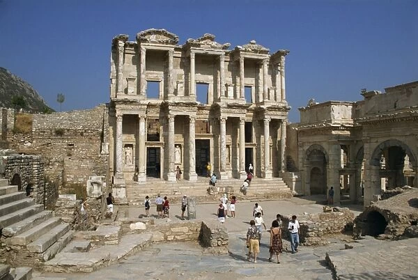 Tourists visiting the Roman Library of Celsus dating