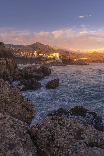 View of Parroquia El Salvador and coastline at sunset in Nerja, Nerja, Malaga Province, Andalucia, Spain, Mediterranean, Europe