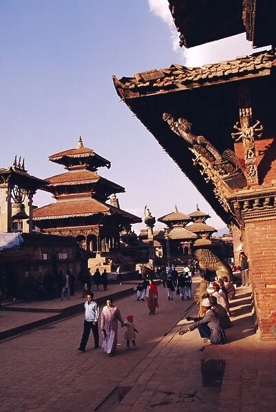 View of temples and people walking in Durbar Square