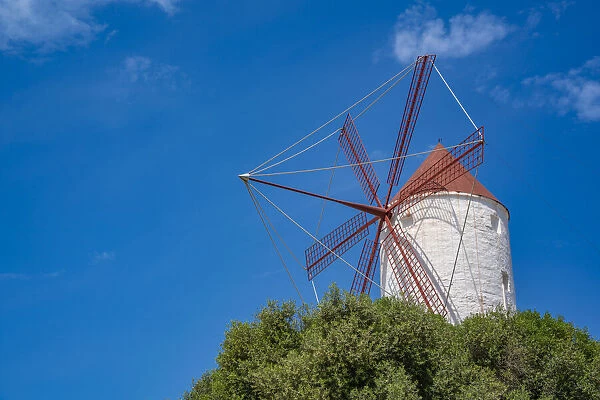 View of windmill against blue sky in Es Mercadal, Menorca, Balearic Islands, Spain, Mediterranean, Europe