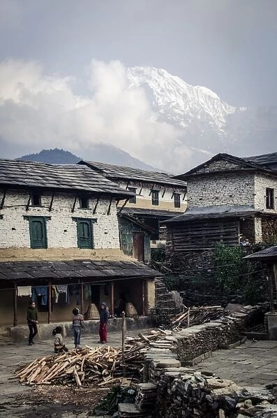 The village of Ghandruk, with Annapurna South in the background, Annapurna Conservation Area, Nepal, Himalayas, Asia