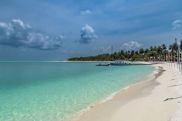 White sand beach with many flags, Bangaram island, Lakshadweep archipelago, Union territory of India, Indian Ocean, Asia