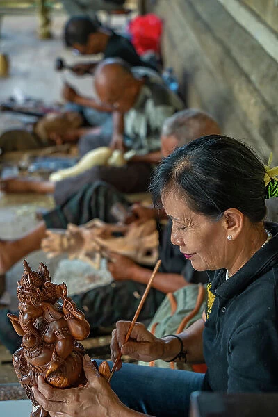 Wood carving skills near Sukawat, Denpasar City, Bali, Indonesia, South East Asia, Asia