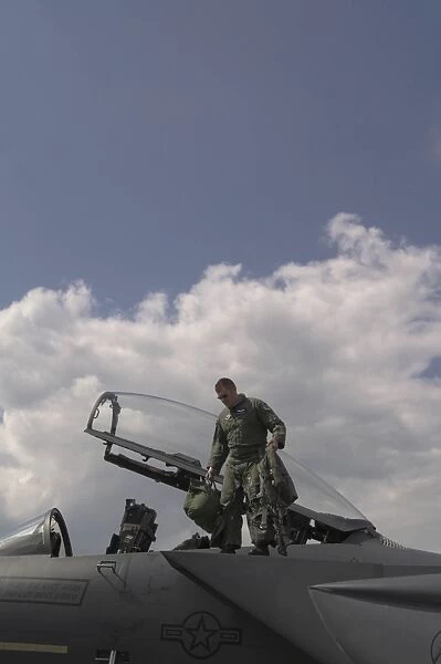 Pilot disembarking from Boeing F-15E Eagle USAF