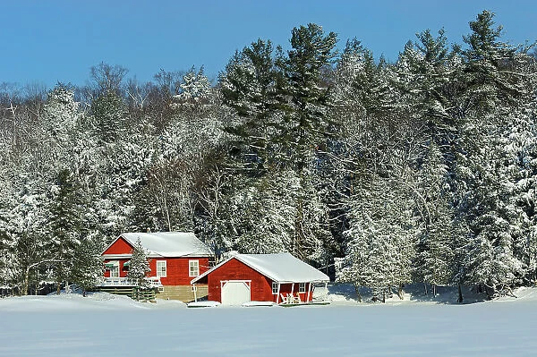 Boathouse on Lake Rosseau in winter. Muskoka Country, Ontario, Canada
