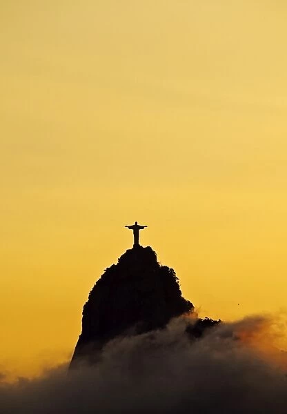 Brazil, City of Rio de Janeiro, Sunset view of the Christ the Redeemer and Corcovado