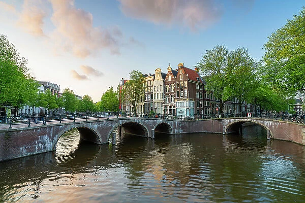 Bridges on Keizersgracht canal at sunset, Amsterdam, Netherlands