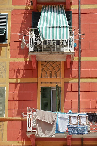 Clothes line on a balcony of a building in the historical cask of Lerici, La Spezia, Liguria, Italy