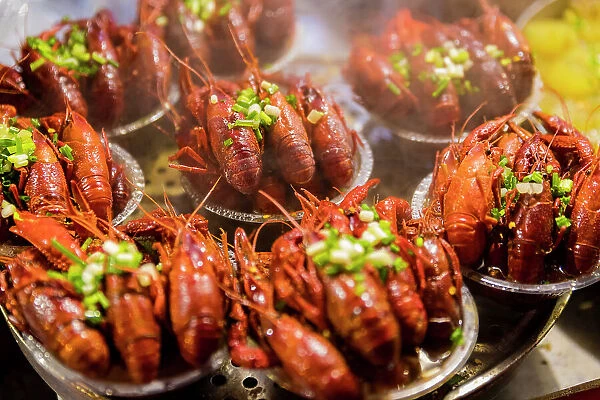 Crayfish displayed at food stall on Wangfujing Snack Street, Beijing, China