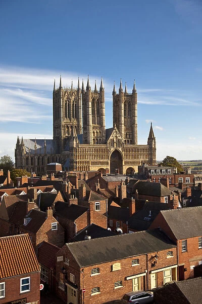 England. The west front of Lincoln cathedral sits high above the cityscape