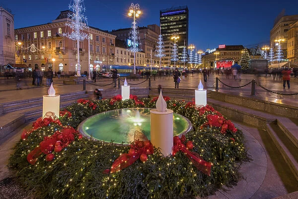 Fountain adorned with Christmas decorations in Ban Jelacic Square, Zagreb, Croatia