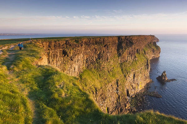 Ireland, County Clare, Cliffs of Moher, 200 meter high cliffs, dusk