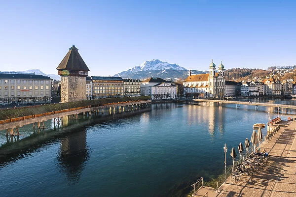 Lucerne, Switzerland. Reuss river view with KapellbrAocke (Chapel Bridge), Jesuit church
