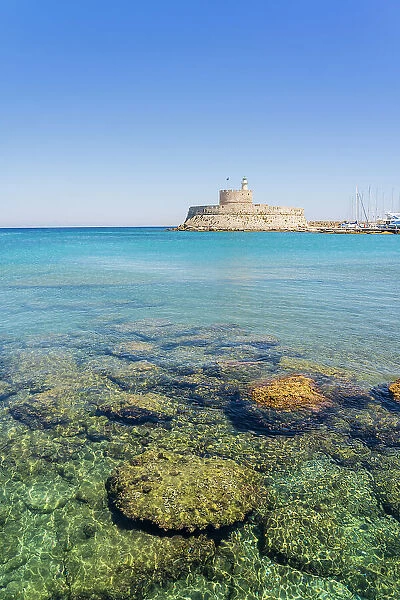 Mandraki Marina and Port looking towards Saint Nicholas Fortress, Rhodes Town, Rhodes, Dodecanese Islands, Greece