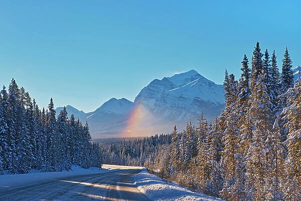 Partial rainbow down the Icefields Parkway n the Canadian Rocky Mountains, Banff National Park, Alberta, Canada