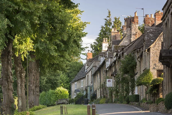 Pretty cottages along The Hill in the Cotswolds town of Burford, Oxfordshire, England