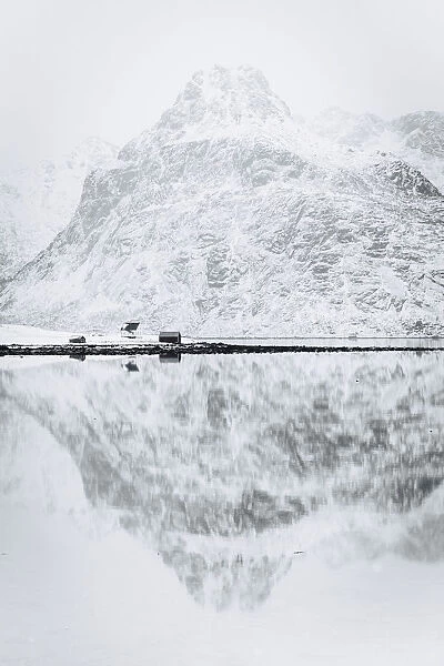 Reflection on a Lofoten Islands fjord near Nusfjord, Lofoten Islands, Nordland