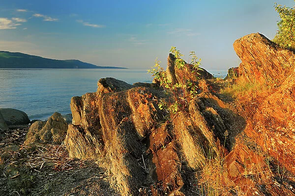 rocky shore of Gulf of St. Lawrence Iles Aux Coudres Quebec, Canada