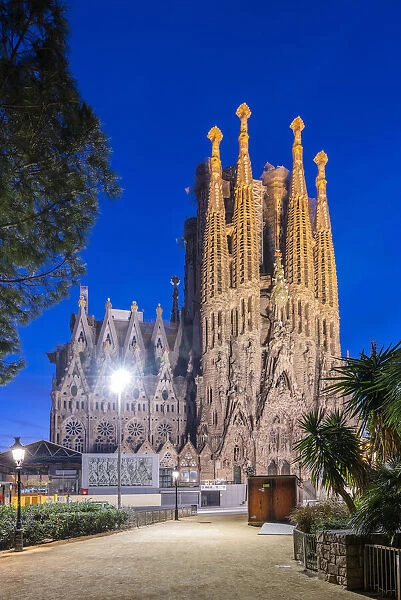 Sagrada Familia basilica church, night view of Nativity facade, Barcelona, Catalonia