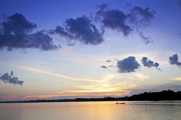 South America, Brazil, Amazonas, a fishmerman at dawn on Mamori lake - formed