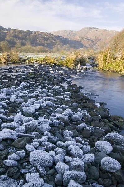 A partially frozen river in Easedale near Grasmere in the Lake District during a cold snap Global warming has caused a recent spate of mild winters making freezing conditions like this much less