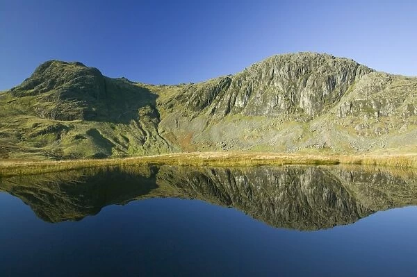 Pavey Ark and Harrison Stickle in the Langdale Valley Lake District UK