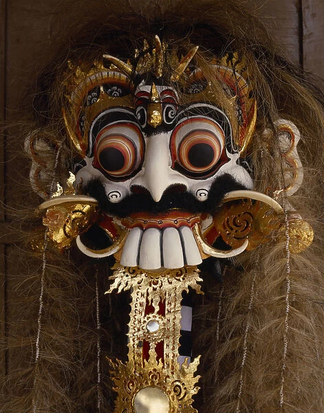 10041902. INDONESIA BALI Decorated ornate mask with protruding eyes teeth and hair