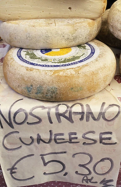 20088235. ITALY Lake Garda Area Display of nostrano cheeses for sale with price in euros