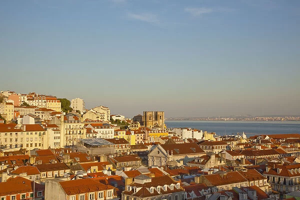 Portugal, Estredmadura, Lisbon, Alfama district, rooftops seen at sunset from Chiado
