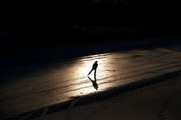Person skates on the Rideau Canal in Ottawa